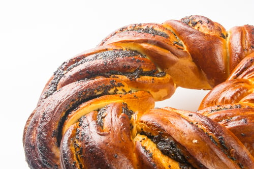Preview: Braided Poppy Seed Round Loaf On White Background