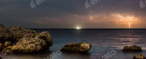 Preview: Sunset And Lightning At Blue Bay Curacao In The Dutch Antilles A Caribbean Island