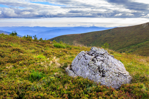 Preview: Panorama Of A Mountain Range And A Large Rock On The Hillside