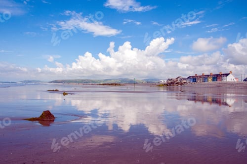Preview: Summertime Beach Scene And Reflections In The Water Along Cardigan Bay, Wales.
