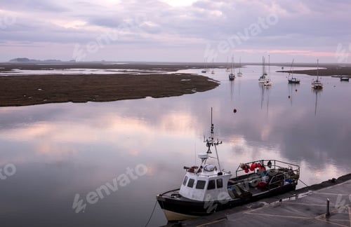 Preview: Solitary Fishing Boat On Calm Water At Wells Next The Sea, Norfolk, Uk