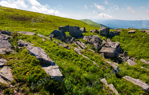 Preview: Mountain Summer Landscape. Meadow With Huge Rocks Among The Grass On Top Of The Hillside Near The