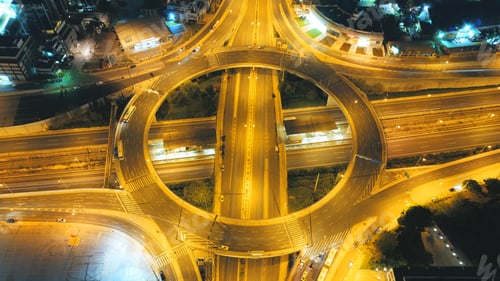 Preview: Aerial Drone High Speed Night Photo Of Urban Elevated Toll Ring Road Junction And Interchange