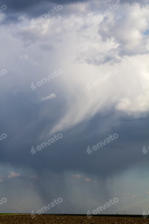 Preview: Beautiful, Dramatic Clouds And Sky. Image Has Grain Texture Seen At Its Maximum Size