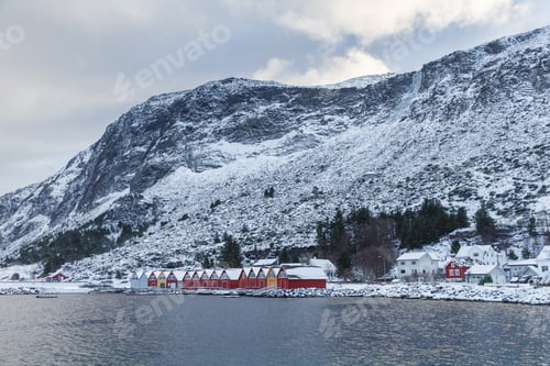 Preview: Colorful Classic Norwegian Rorbu Fishing Hut In Alnes. Winter Landscape At Godoya Island, Norway.