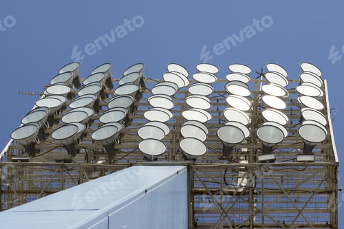 Preview: Closeup Of A Stadium Lights With Blue Sky.