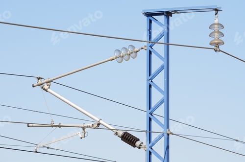 Preview: Forefront Of A Railway Catenary With A Blue Sky