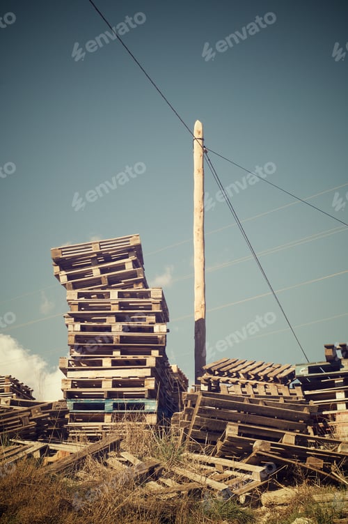 Preview: Wood Pallets Stacked With Blue Sky.