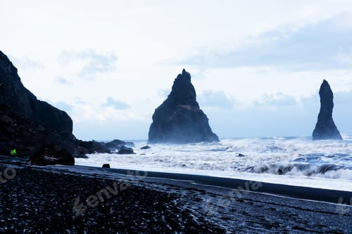 Preview: The Black Sand Beach Of Reynisfjara And The Mount Reynisfjall From The Dyrholaey Promontory In The