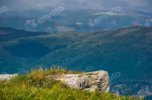 Preview: Rocky Cliff Over The Valley With Rolling Hills. Lovely Mountainous Scenery With Deep Perspective