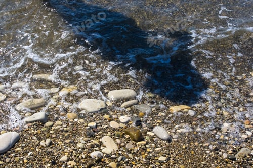 Preview: Sea Pebble Beach With Multicoloured Stones, Transparent Waves With Foam, On A Warm Summer Day With