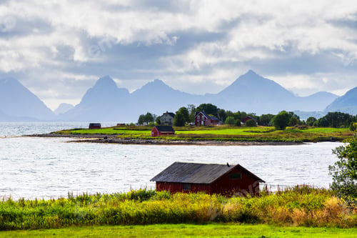 Preview: Norwegian Coast Landscape With A Typical Red House. Wooden Red Houses Are Called Rorbu Or Rorbuer