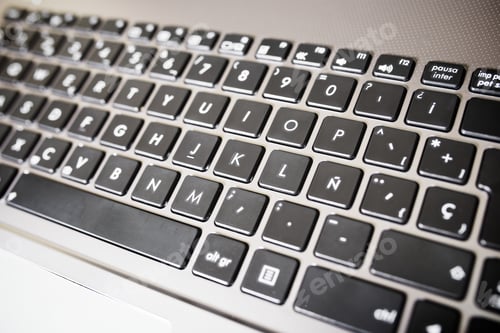 Preview: Forefront Of A Gray Laptop Keyboard.