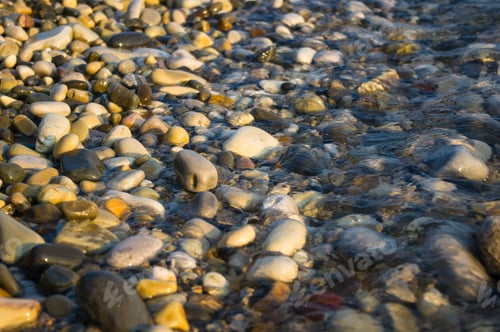 Preview: Pebble Stones On The Sea Beach, The Rolling Waves Of The Sea With Foam