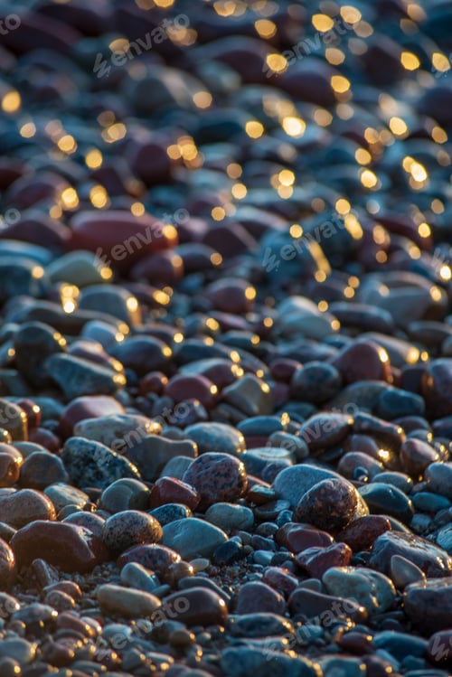 Preview: Abstract Details Of Rocky Beach Pebbles In Sunset By The Sea With Foam Waves
