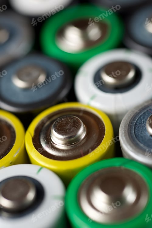 Preview: Many Batteries On A Metal Table.