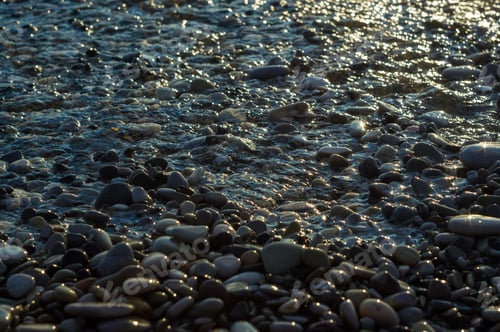 Preview: Pebble Stones On The Sea Beach, The Rolling Waves Of The Sea With Foam
