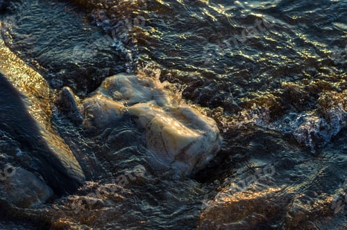 Preview: Pebble Stones On The Sea Beach, The Rolling Waves Of The Sea With Foam