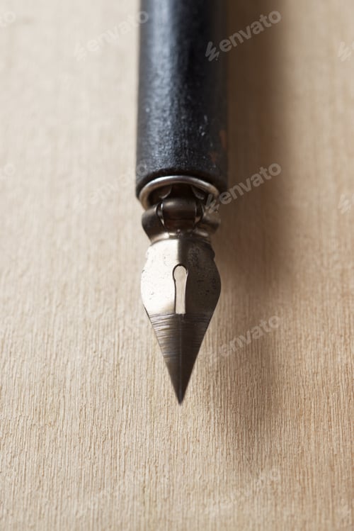 Preview: Nib Pen For Calligraphy On A Wood Table.