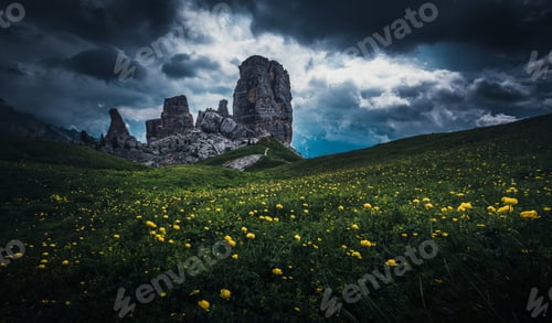 Preview: Cinque Torri In The Italian Dolomites Mountains With Beautiful Flowers In The Foreground.