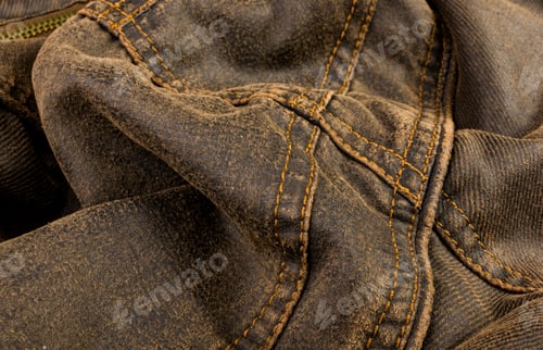 Preview: Clothing Items Stonewashed Cotton Fabric Texture With Seams, Clasps, Buttons And Rivets, Macro