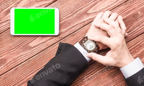 Preview: View Of A Hands Of A Businessman With A Tablet Pc On The Wooden Table. Mock Up