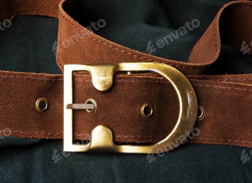 Preview: Closeup Of The Brown Suede Strap With Yellow Metal Buckle