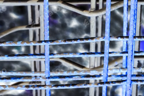 Preview: Abstract Composition From Metallic Lattice With Rust Over Another Metallic Lattices With Soil