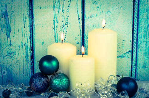 Preview: White Burning Candles Decoration Against Blue Wooden Background