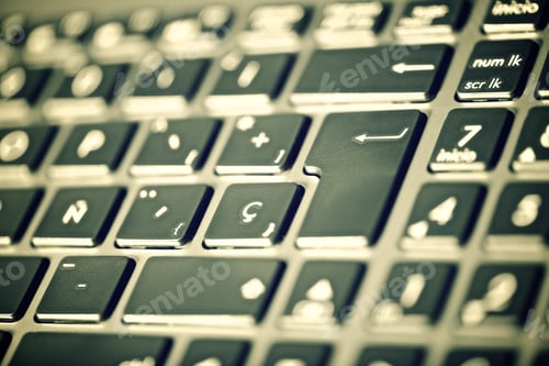 Preview: Forefront Of A Gray Laptop Keyboard.
