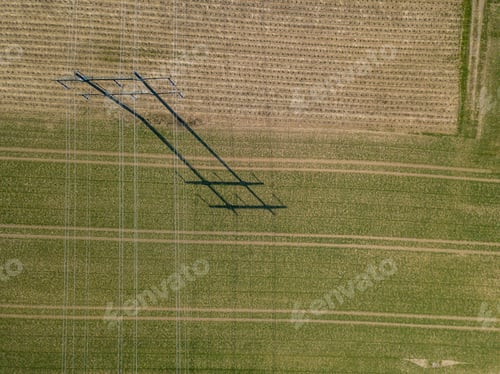 Preview: Aerial View Of Power Line Pylon With Wires. Electric Grid Network For Power Transmission In Rural