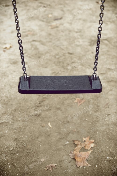 Preview: Closeup Of A Child Swing With Unfocused Background