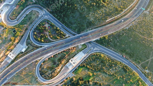 Preview: Aerial Drone Photo Of Multilevel Junction Highway Passing Through Mountain