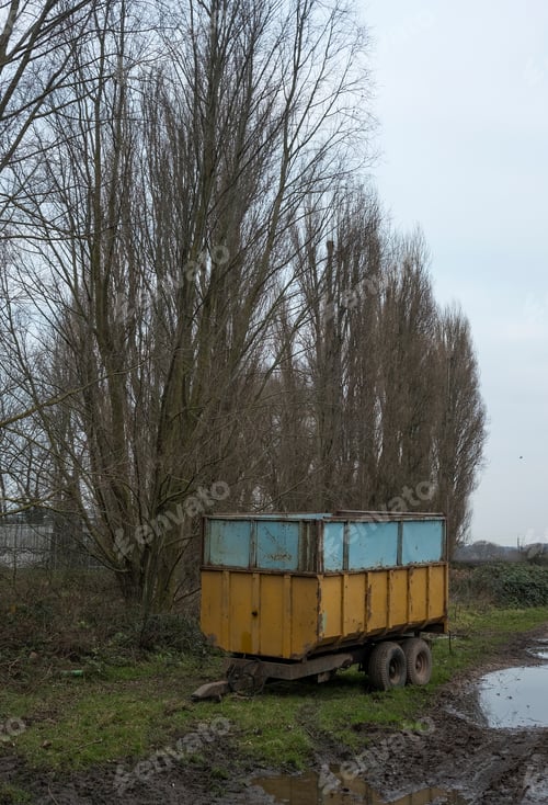 Preview: Big Farm Trailer Next To A Muddy Track