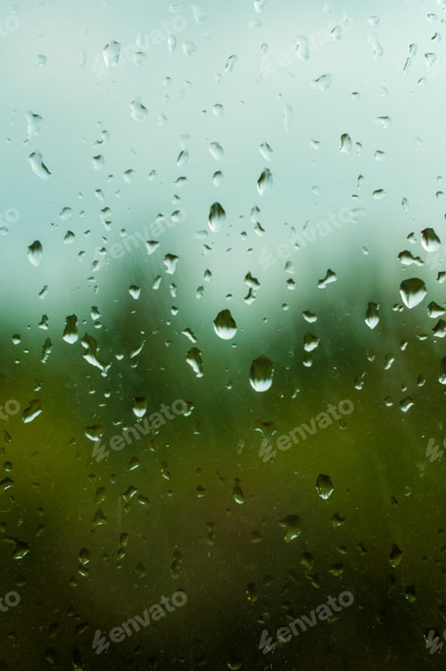 Preview: Raindrops On Window Glass On Background Of Cloudy Sky