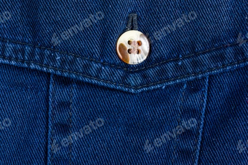 Preview: Close-Up of Blue Denim with Button Detail