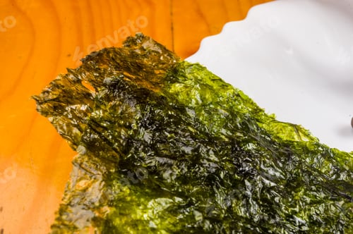 Preview: Nori Chips On A White Ceramic Plate, Seaweed Sheets
