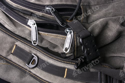 Preview: Closeup Of Buckles, Clasps, Zippers, Pockets, Fasteners, Fittings And Seams In The Brown Backpack
