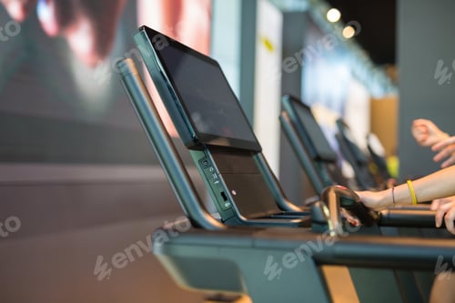 Preview: Detail Of Fingers Touching A Touchscreen Of Modern Running Machine In A Fitness Center