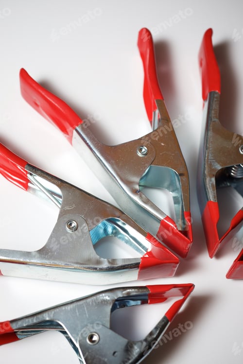 Preview: Clamps On A White Table