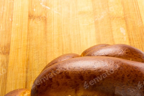 Preview: Chunks Large Braided Loaf On Wooden Background