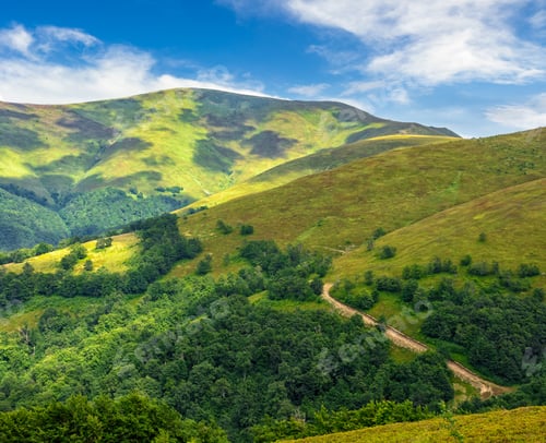 Preview: Summer Mountain Landscape With Path Through The Hillside Under The Blue Sky With Clouds