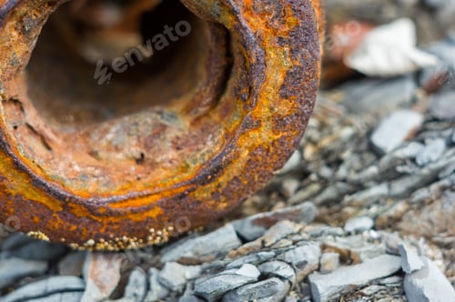 Preview: Very Rusty Metal On A Gray Cracked Rock