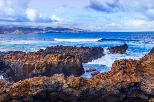Preview: The Picturesque Rock At The Coast Of The Atlantic Ocean Is Washed By Waves