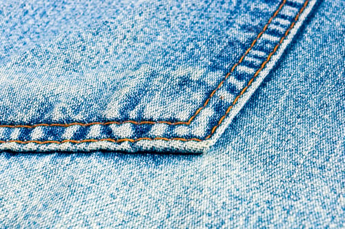 Preview: Clothing Items Blue Stonewashed Faded Jeans Cotton Fabric Texture With Seams, Clasps, Buttons And