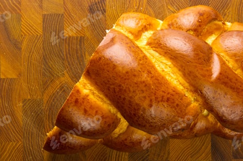 Preview: Chunks Large Braided Loaf On Wooden Background