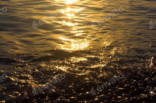 Preview: Sea Pebble Beach With Multicoloured Stones, Transparent Waves With Foam, On A Warm Evening