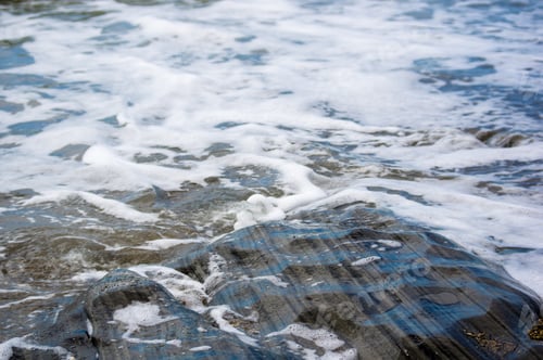 Preview: Pebble Stones On The Sea Beach, The Rolling Waves Of The Sea With Foam