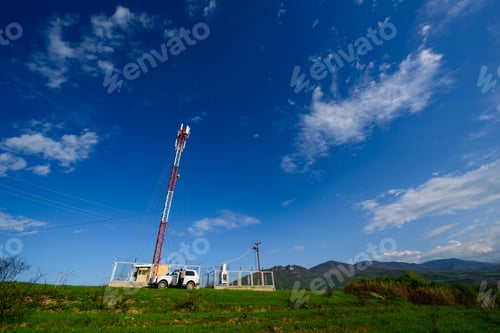 Preview: Telecommunication Radio Antenna Tower With Blue Sky With Cloud.