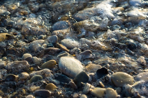 Preview: Pebble Stones On The Sea Beach, The Rolling Waves Of The Sea With Foam